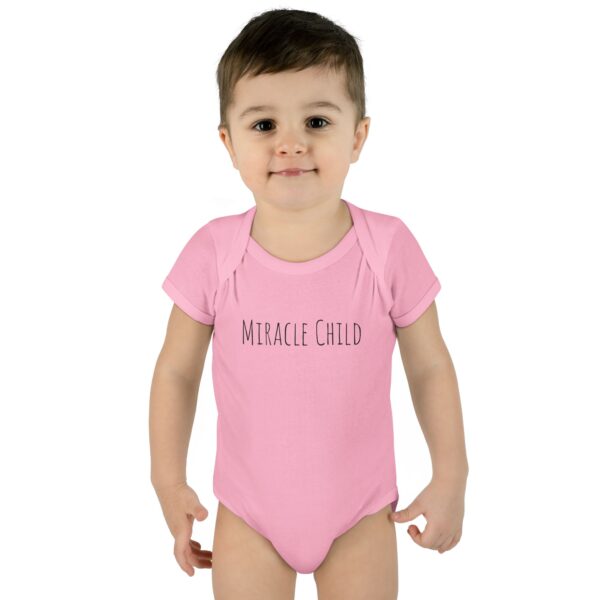 16471970575576144554_2048.jpeg Miracle Child Unisex Onesie