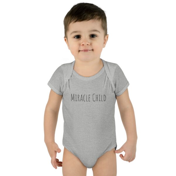 17136428044892967945_2048.jpeg Miracle Child Unisex Onesie