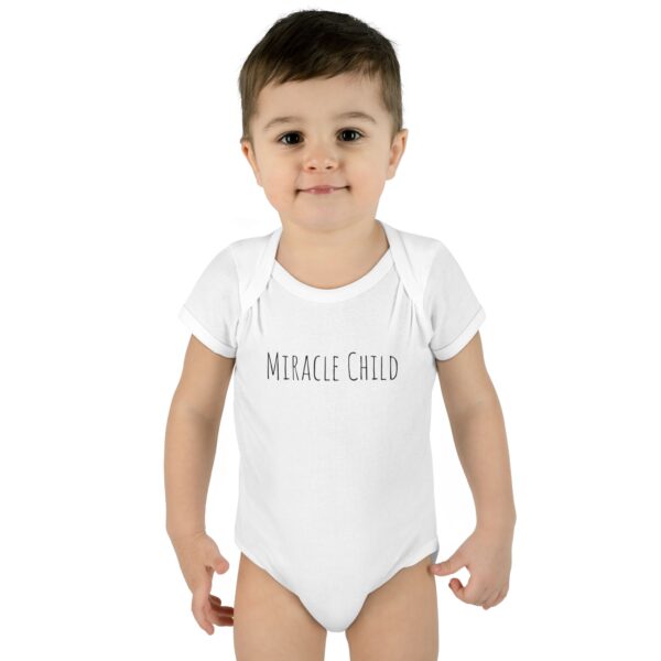 3922241728495848415_2048.jpeg Miracle Child Unisex Onesie