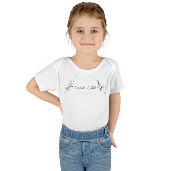 6651947474941554570_2048.jpeg Girly Miracle Child Unisex Onesie